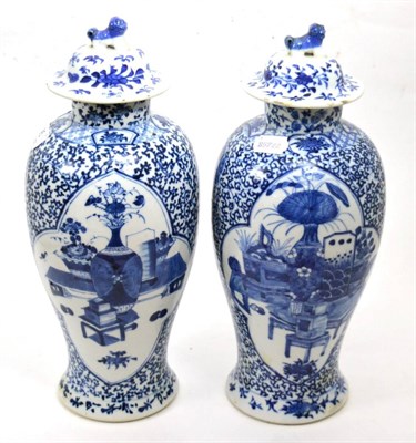 Lot 95 - A pair of Chinese blue and white vases and covers