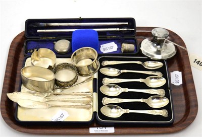 Lot 101 - A group of silver including spoons, inkwell, napkin rings, pen/pencil holder, thimbles etc