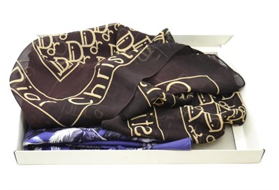 Lot 117 - Hermes blue silk scarf Les Mustangs, Christian Dior rectangular logo scarf and black and white...