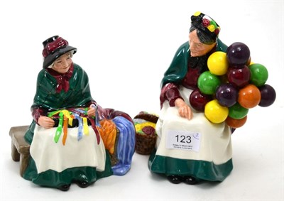 Lot 123 - Two Royal Doulton figures ";The Old Balloon Seller"; HN1315 and ";Silks and Ribbons"; HN2017