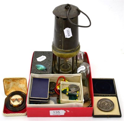 Lot 135 - Miners lamp, travelling oil lamp, Ruskin mounted pewter box, medals, coins etc