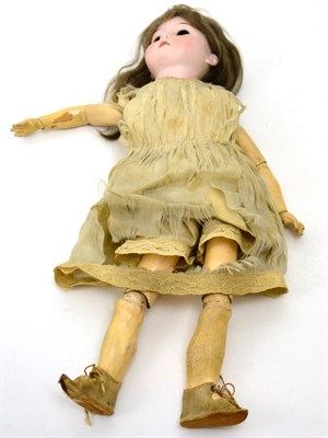 Lot 140 - Armand Marseille bisque socket head doll, on jointed body, brown wig (missing eyes)
