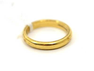 Lot 164 - A band ring, stamped '14K' finger size U
