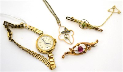 Lot 176 - A lady's wristwatch stamped '375', a 9ct gold bar brooch, another stamped 15ct and a small...