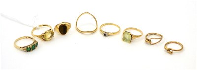 Lot 179 - Four gem set rings, a 9ct gold wishbone ring and three other rings (8)