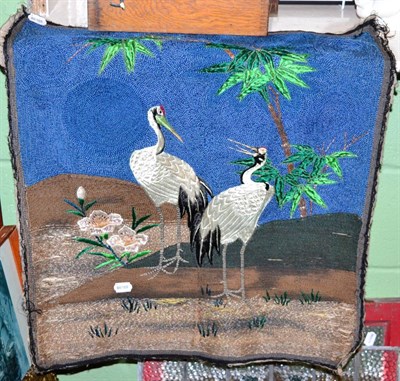 Lot 208 - A Chinese embroidered panel with script back