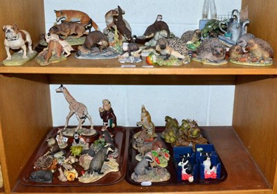 Lot 216 - A large collection of Border Fine Art, Teviotdale and other models of wild animals and dogs (on two