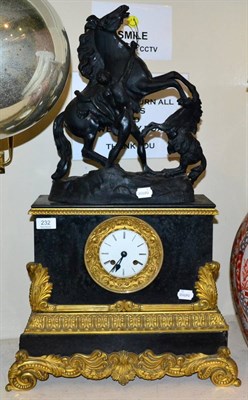 Lot 232 - A gilt metal mounted striking mantel clock surmounted by a spelter Marley horse, the white...