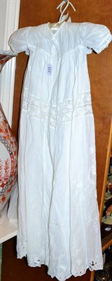Lot 234 - Late 19th century white cotton Christening gown, with short sleeves, lace insertions, stylised...