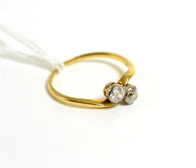 Lot 263 - An 18ct gold diamond two stone twist ring finger size O1/2