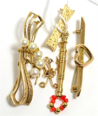 Lot 266 - A 9ct gold lace bobbin brooch, a heart brooch and a pearl set brooch (3)