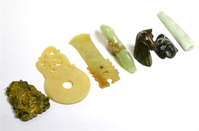 Lot 279 - Chinese celadon jade figure of a tiger; a brown jade pendant; a Chinese celadon jade Han-style pig