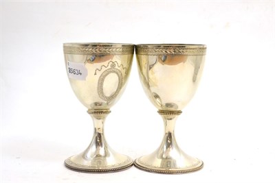 Lot 338 - A pair of George III style silver wine goblets, by C J Vander, London 1968