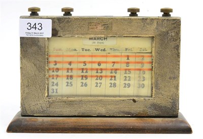 Lot 343 - A 1930's oak and silver mounted desk calendar, Birmingham 1936