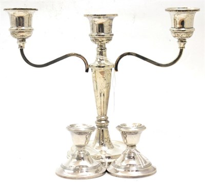 Lot 352 - A silver candelabra, by W I Broadway & Co, Birmingham 1975 and a pair of silver dwarf...