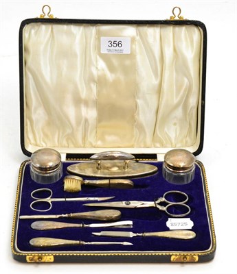 Lot 356 - Cased silver mounted manicure set