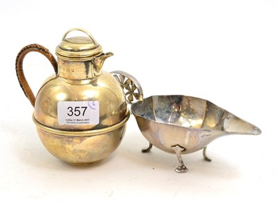 Lot 357 - Silver Devon cream jug and a silver sauce boat
