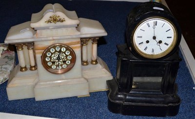 Lot 377 - An alabaster mantel clock of architectural form together with an ebonised mantel clock (2)
