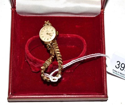 Lot 399 - A lady's 9ct gold wristwatch signed Omega in an Omega box