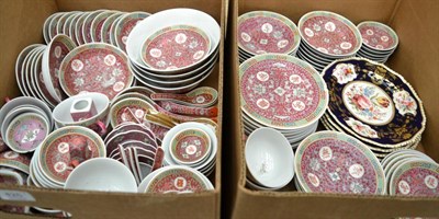 Lot 425 - An extensive 20th century Chinese porcelain dinner service, red ground with character roundels,...