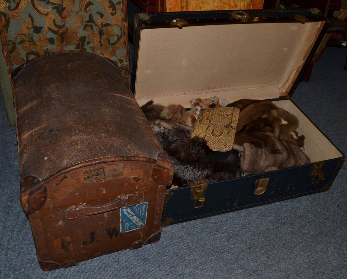 Lot 433 - Two hinged trunks enclosing a mink and ermine fur stole, fox furs, silver tipped fox evening jacket