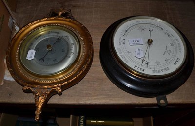 Lot 448 - Barometer in an ebonised case together with a modern gilt framed barometer