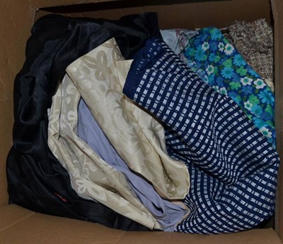 Lot 469 - Three boxes of assorted clothing and upholstery fabric, long length of cream silk, cotton, wool etc