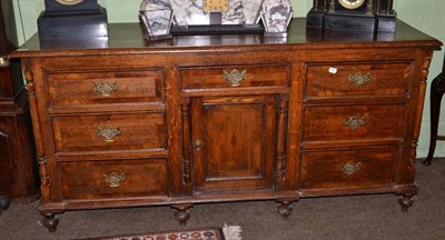 Lot 523 - A Georgian oak sideboard