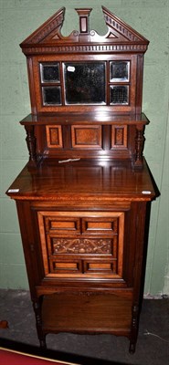 Lot 531 - Burr walnut and mahogany panelled and mirrors music cabinet