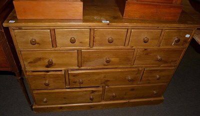 Lot 548 - A 20th century pine chest fitted with an arrangement of drawers&nbsp