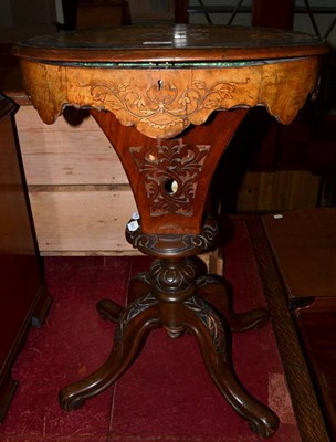 Lot 564 - A Victorian walnut marquetry work table