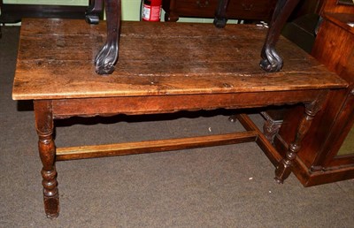 Lot 586 - A small 18th century oak refectory dining table