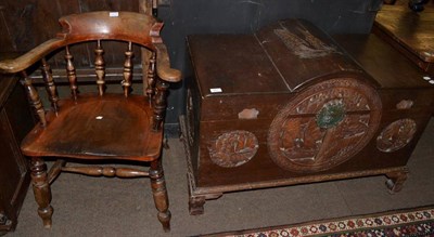 Lot 587 - A High Wycombe smokers' chair and a camphor wood chest