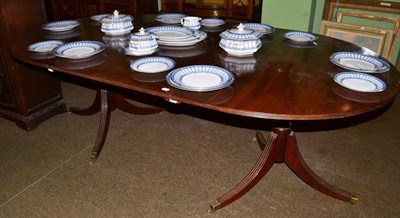 Lot 589 - A mahogany twin pedestal dining table