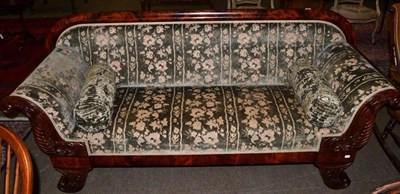 Lot 594 - Flame mahogany framed scroll end sofa