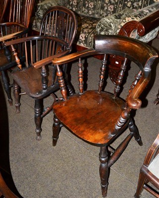 Lot 596 - A 19th century oak and elm Windsor chair, together with an oak smokers' chair of similar date