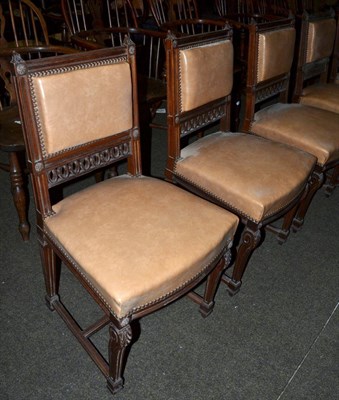 Lot 604 - A set of six French walnut dining chairs