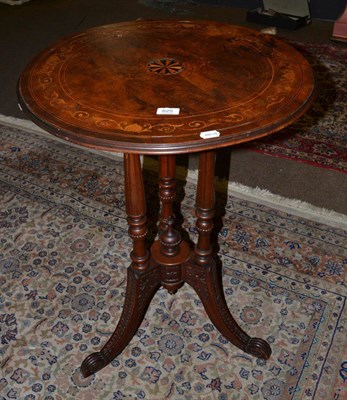 Lot 625 - A Victorian walnut circular table on fluted supports