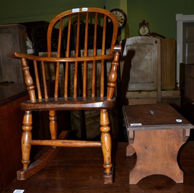 Lot 631 - A 19th century child's rocking chair and an elm stool