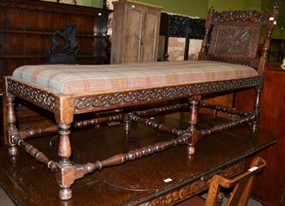 Lot 634 - A Victorian carved oak day bed&nbsp