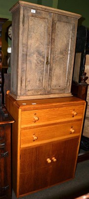 Lot 643 - An oak cabinet together with a hanging cabinet (2)