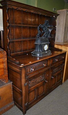 Lot 644 - Carved oak dresser and rack