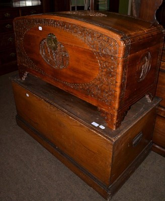 Lot 645 - A Chinese carved camphor wood chest together with a pine blanket box