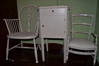 Lot 653 - A French marble top bedside cabinet, child's chair and cane seated chair (all painted to match)