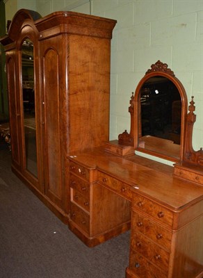 Lot 656 - An oak mirror fronted triple wardrobe, the twin doors with burr oak panels, together with a...