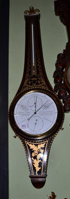 Lot 660 - Gilt metal mounted wheel barometer by Comitti & Son