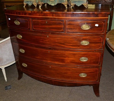 Lot 663 - George III inlaid mahogany bow fronted four height chest of drawers