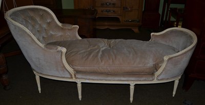 Lot 664 - A cream coloured painted daybed