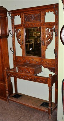 Lot 670 - Late Victorian carved oak mirrored hall stand