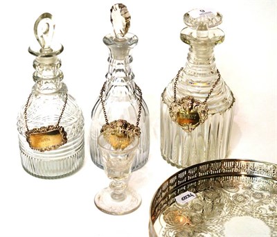 Lot 9 - Three glass decanters with silver spirit labels ";Port";, ";Gin";, ";Whisky"; and a 19th...